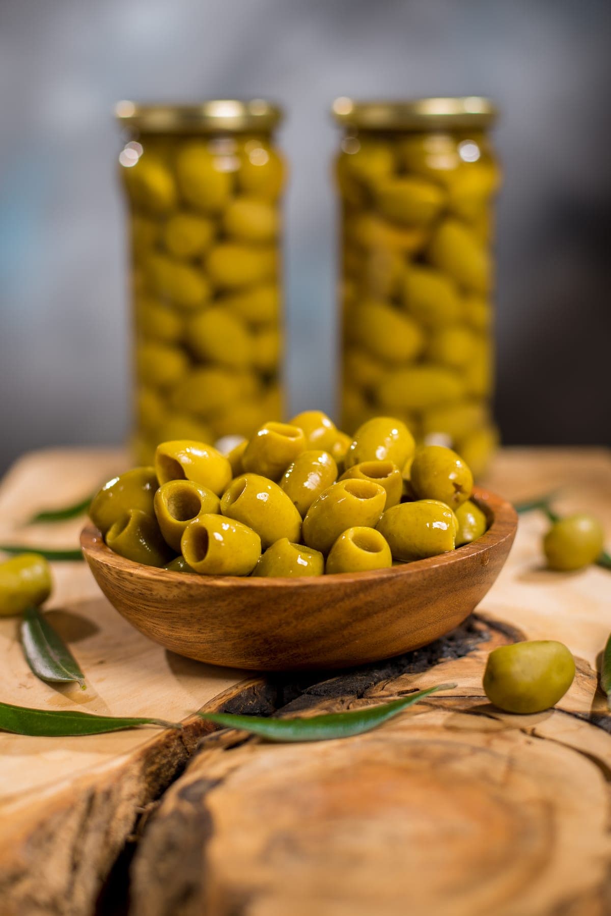 Sliced olive rings served in a wooden bowl